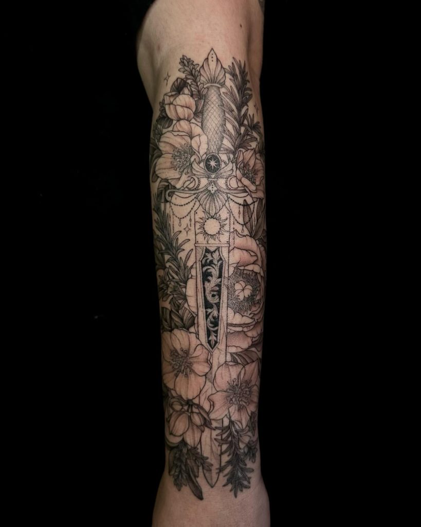 Celestial Blade witchy flower tattoo